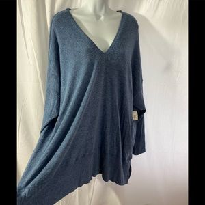 Sweater find it 3X rapid blue. 9 inch deep V-neck.